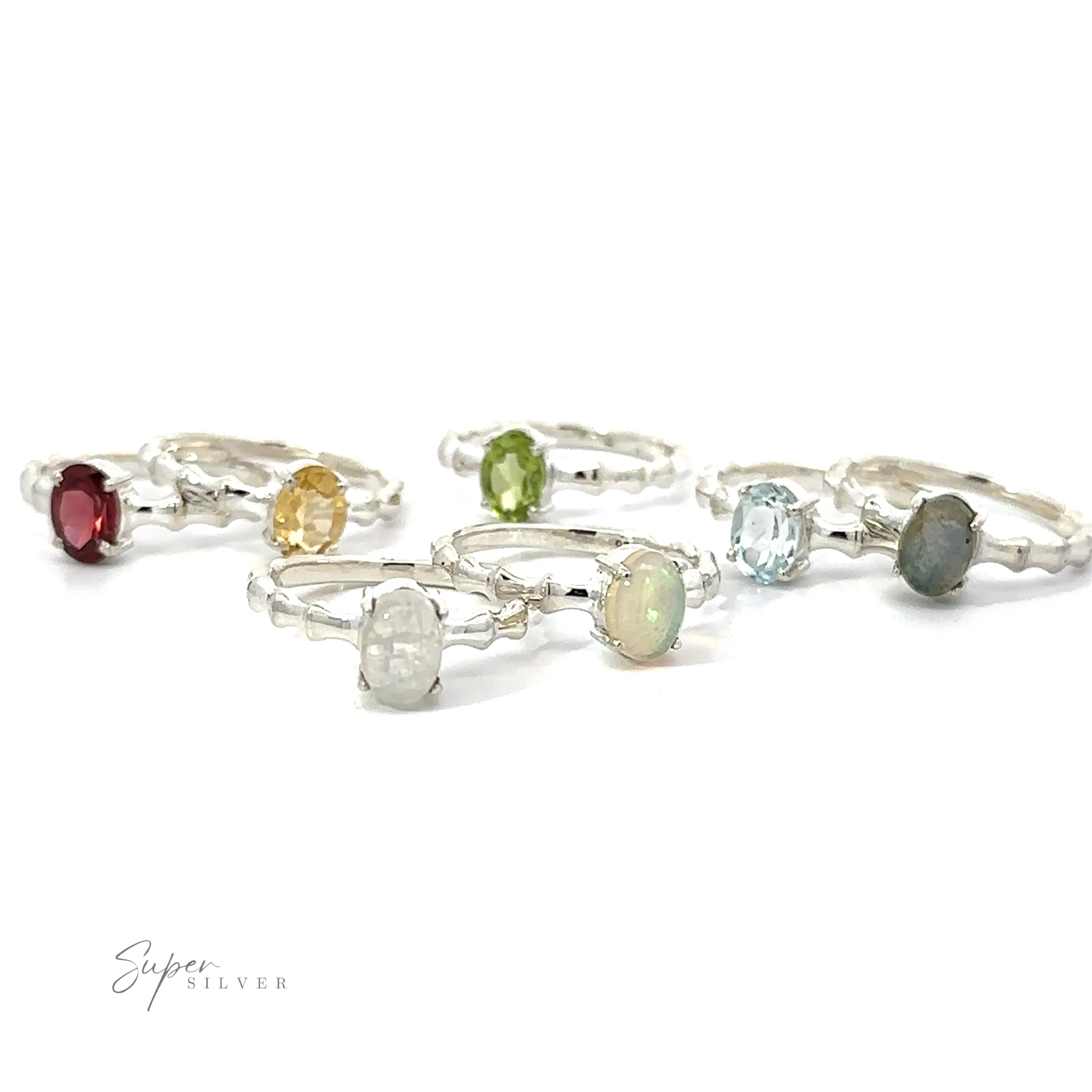Pronged Oval Gemstone Ring with Textured Band