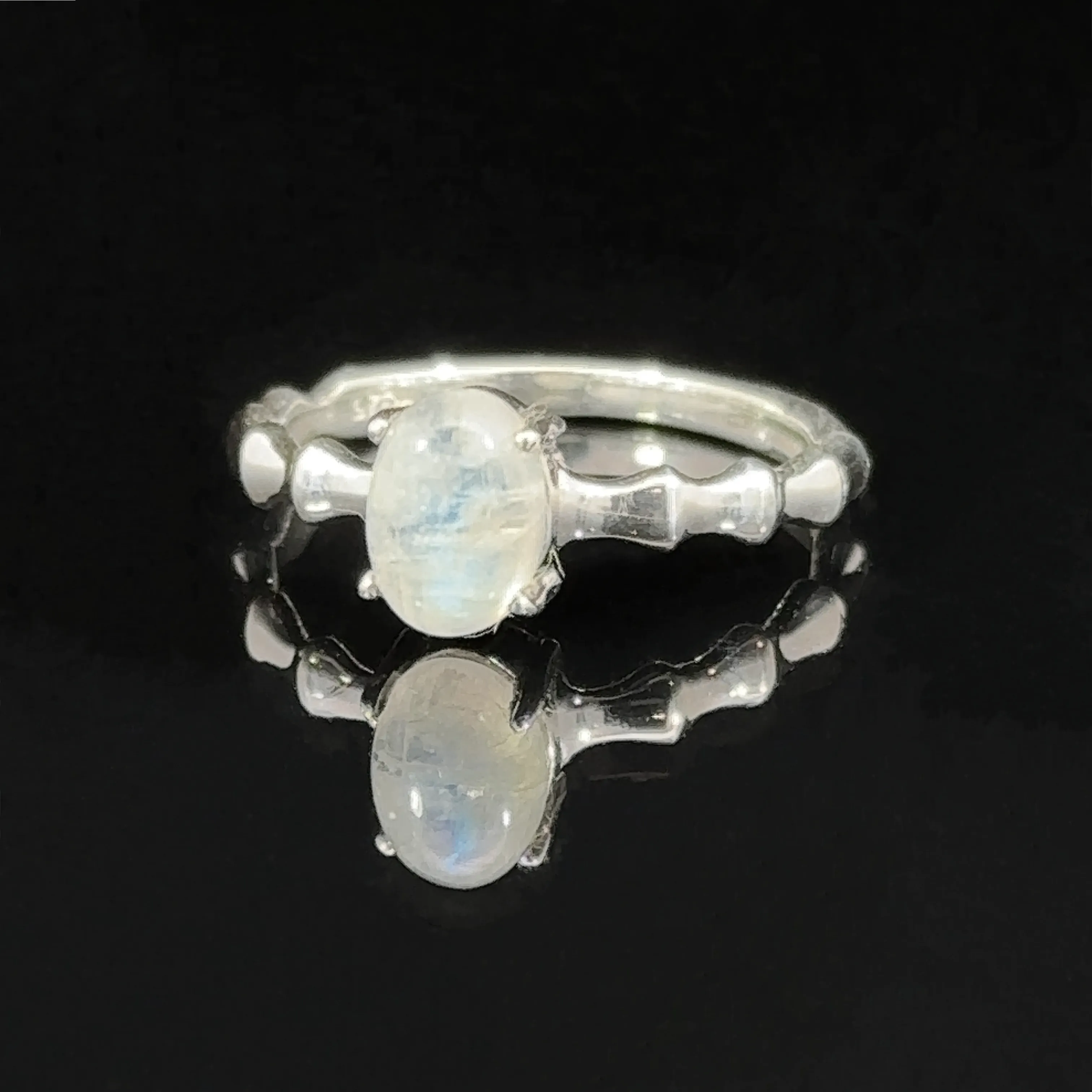 Pronged Oval Gemstone Ring with Textured Band