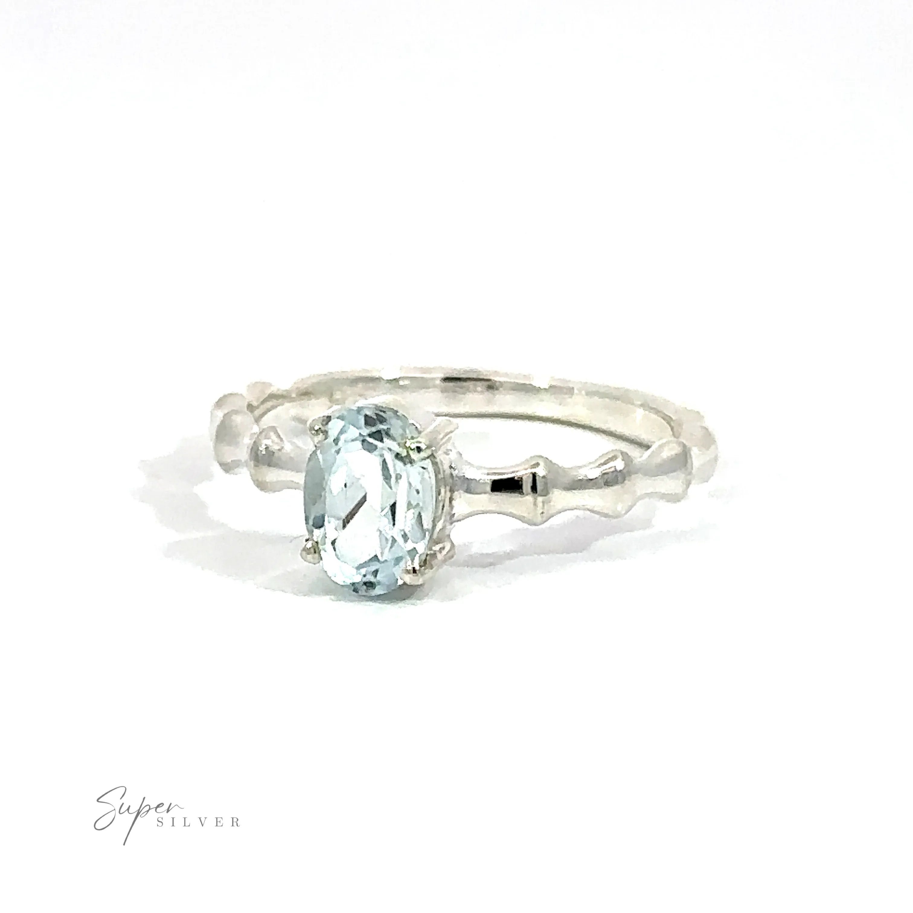 Pronged Oval Gemstone Ring with Textured Band