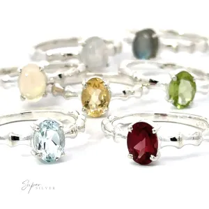 Pronged Oval Gemstone Ring with Textured Band