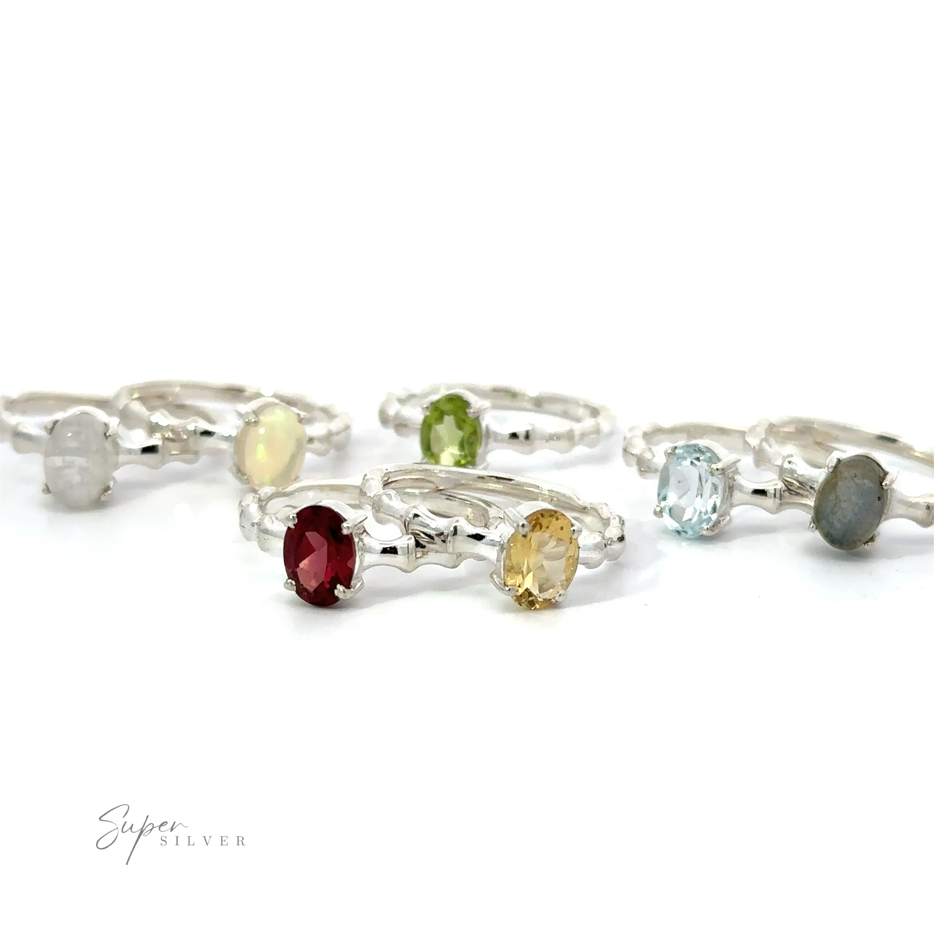 Pronged Oval Gemstone Ring with Textured Band