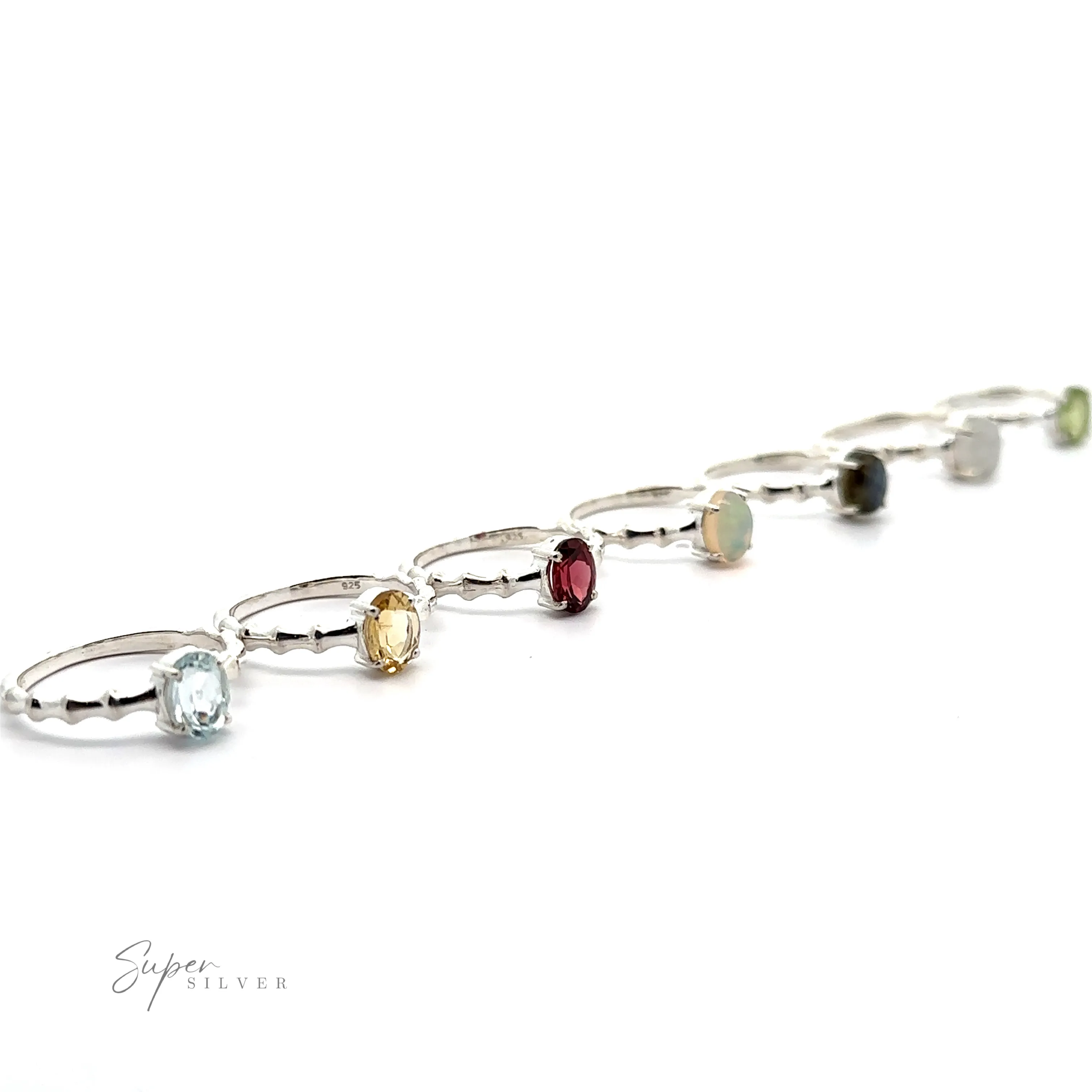 Pronged Oval Gemstone Ring with Textured Band