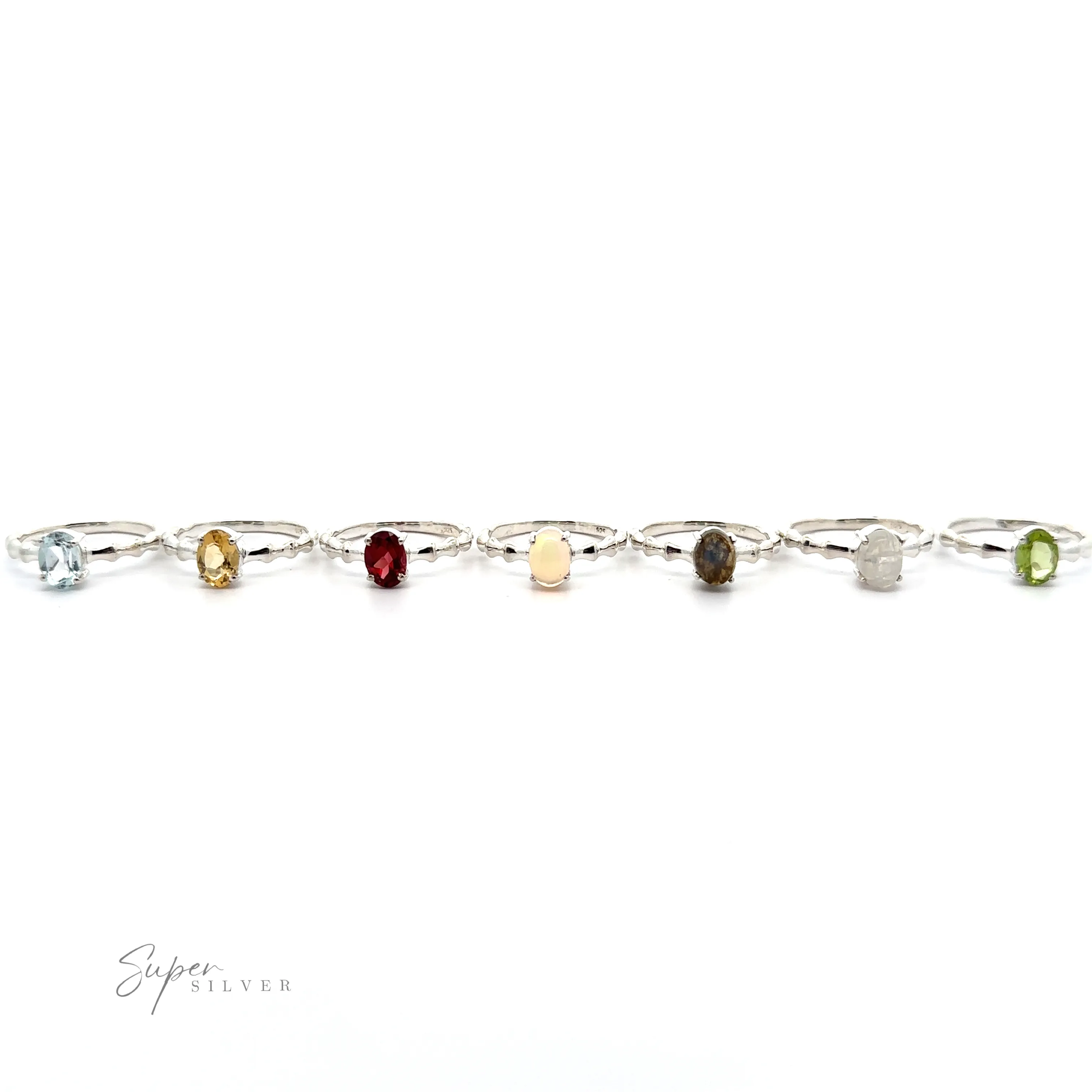 Pronged Oval Gemstone Ring with Textured Band