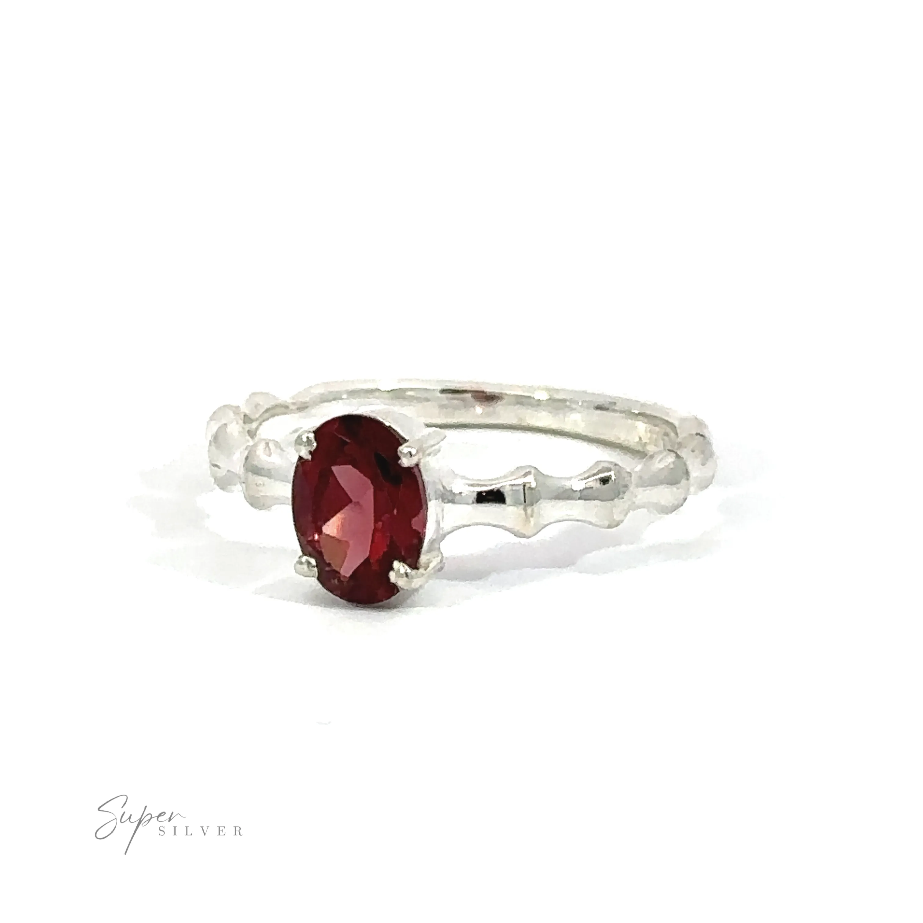 Pronged Oval Gemstone Ring with Textured Band